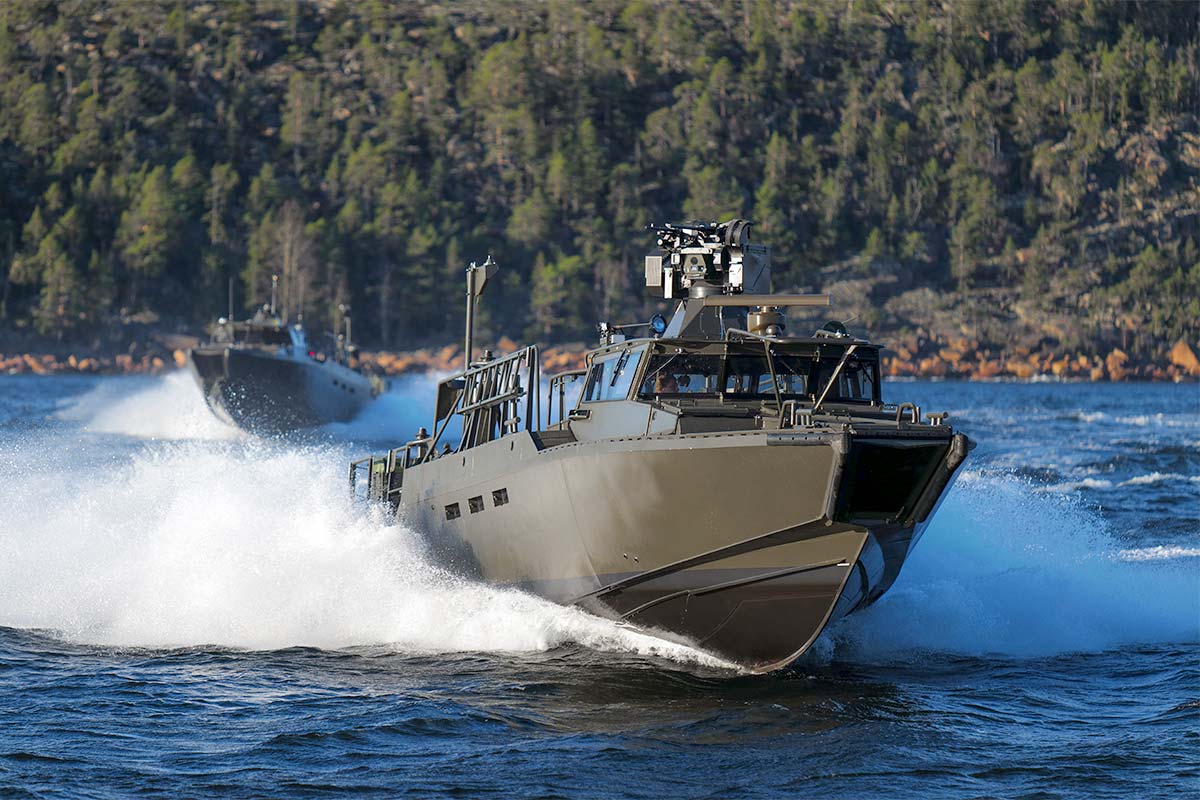 Two Combat boats 90 at full speed at sea